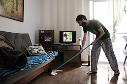 A man mopping