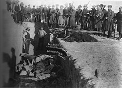 Mass grave for the dead Lakota after massacre of Wounded Knee.