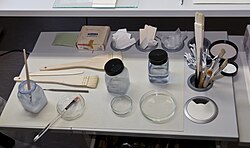 Book conservation tools and chemicals