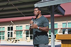 Walker giving a speech on mental health, 2017