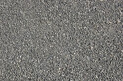 Graded mechanically crushed stone, with particle sizes roughly between 5 and 15 mm