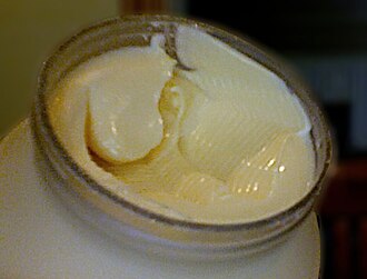 Mayonnaise is a Bingham plastic. The surface has ridges and peaks because Bingham plastics mimic solids under low shear stresses.