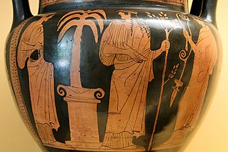 From left to right: Artemis holding an oinochoe, Apollo holding a laurel branch and a phiale, about to pour a libation on the altar. Attic red-figure column-krater 450 BCE. National Archaeological Museum (Madrid)