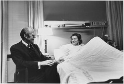 President Ford sits at Betty's bedside at Bethesda Naval Hospital on October 2, 1974, as she recovers from her mastectomy.