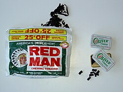 A pouch of Red Man loose leaf chewing tobacco and Oliver Twist tobacco bits/pellets