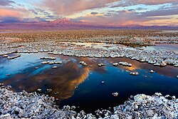 Salar de Atacama with the Licancabur Volcano in the background.