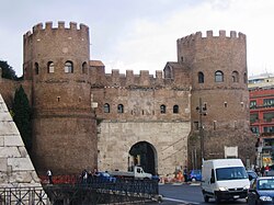Porta San Paolo, a gate in the Aurelian Walls, built between AD 271 and AD 275. During the Gothic Wars of the mid-6th century, Rome was besieged several times by Eastern Roman and Ostrogoth armies. Ostrogoths of Totila entered through this gate in 549, because of the treason of the Isaurian garrison.