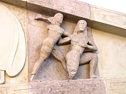 A possible Titanomachy: A beardless Zeus is depicted launching a thunderbolt against a kneeling figure (a Titan?) at the Gorgon pediment from the Temple of Artemis in Corfu as exhibited at the Archaeological Museum of Corfu.