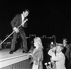 Paul Anka posing for a camera at Linnanmäki summer concert on August 19, 1959, in Helsinki, Finland