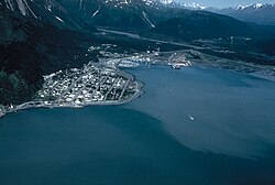 Aerial view of Seward, Alaska, in the 1990s, looking north. The mouth of the Resurrection River and the base of Mount Marathon are visible.