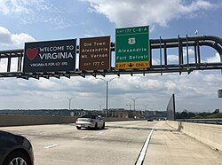 Virginia welcome sign on the Inner Loop over the Wilson Bridge. A short stretch of the bridge just before this sign is in the District of Columbia.