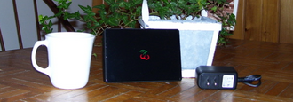 Cherrypal C114 with 110 V power adapter.