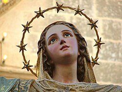 A statue of Mary crowned with 12 stars, a reference to Revelation 12. Statue by Attard, Malta