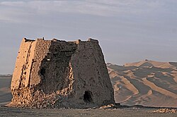 The ruins of a Han dynasty watchtower made of rammed earth at Dunhuang, located at the eastern edge of the Silk Road
