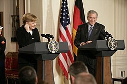 George W. Bush with German chancellor Angela Merkel