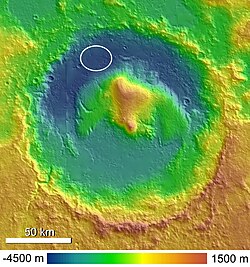 Colorized shaded relief map of the crater Gale. The general landing area for Curiosity on the northwestern crater floor, named Aeolis Palus, is circled. (HRSC data)