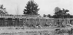 Workers completing a Civilian Conservation Corps barracks in 1934 at Green Lakes State Park in Fayetteville, New York