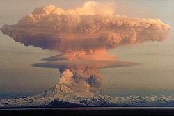 Eruption cloud from Redoubt Volcano on 21 April 1990 as viewed to the west from the Kenai Peninsula, more than 60 km (37 mi) from the volcano's summit