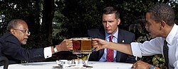Gates, Sgt. James Crowley and President Barack Obama toast at the start of their meeting in the White House Rose Garden, July 30, 2009