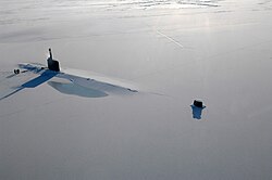 US Navy attack submarine USS Annapolis rests in the Arctic Ocean after surfacing through one metre of ice during Ice Exercise 2009 on 21 March 2009.