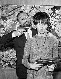 A KAOS agent, played by Joseph Ruskin, stops Agent 99.