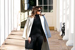 Trump wearing a coat over her shoulders