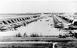 Approximately 50 F-105Ds on the flightline at Korat, 1 July 1968. KC-135s from U-Tapao are parked in the background