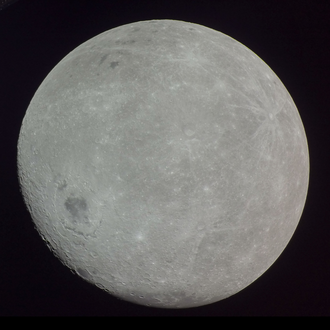 Photograph of the far side of the Moon, with Mare Orientale (center left) and the mare of the crater Apollo (top left) being visible, taken by Orion spacecraft during the Artemis 1 mission.