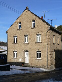 A house constructed of tuff blocks in Rieden, Rhineland-Palatinate, in the Volcanic Eifel region, Germany