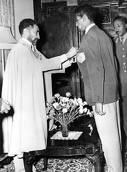 Awarding Abebe Bikila the Order of the Star of Ethiopia, 1960, after winning the Olympic Gold Medal