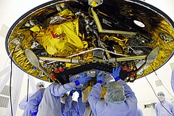 Phoenix Mars Lander being worked on by NASA engineers. The planned operational life of the Phoenix lander was 90 Martian days. Each Martian day is 40 minutes longer than an Earth Day.