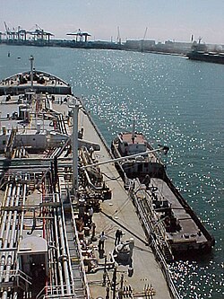 An oil tanker taking on fuel, or "bunkering"