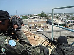 Brazilian Army snipers are positioned to defend UN base during combat with gangs in the Haitian capital Port-au-Prince in 2011.