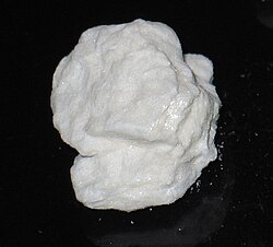 A piece of compressed cocaine hydrochloride, commonly used for smuggling
