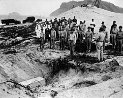 The body of Japanese fighter pilot Fusata Iida was buried with military honors by US troops on December 8, 1941.