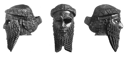 The so-called "Mask of Sargon", after restoration, in 1936. The braided hair and royal bun, reminiscent of the headgears of Meskalamdug, Eannatum or Ishqi-Mari, are particularly visible. On stylistic grounds, this is now thought to represent Sargon's grandson Naram-Sin, rather than Sargon himself.[92]