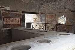 Thermopolium of Vetutius Placidus opening directly onto the Via dell'Abbondanza