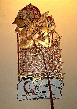 Batara guru with Nandi bull in Javanese wayang (puppet theatre) artworks.[16][17]