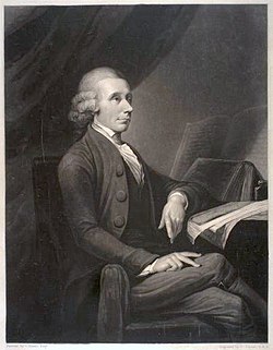 A drawing of an elderly man sitting by a table and facing parallel to the drawing. His left arm rests on a notebook, legs crossed.