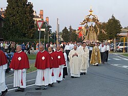 A Feast of Our Lady of the Rosary procession during October in Bergamo, Italy