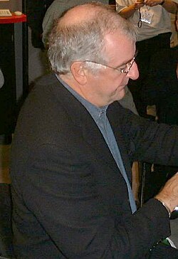 Adams at software convention ApacheCon in 2000