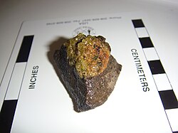 Olivine weathering to iddingsite within a mantle xenolith