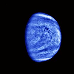 Photograph taken by the uncrewed Galileo space probe en route to Jupiter in 1990 during a Venus flyby. Smaller-scale cloud features have been emphasized and a bluish hue has been applied to show that it was taken through a violet filter.