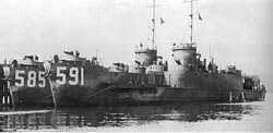 The large infantry landing craft USS LCI(L)-585 and USS LCI(L)-591 at Cold Bay, in the spring of 1945, awaiting transfer to the Soviet Navy, in which they became DS-45 and DS-35, respectively. The Soviets returned LCI(L)-585 to the United States, in 1955; DS-35 was sold for scrap in the Soviet Union.[10]