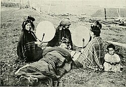 Three machi engage in a healing ritual in 1908