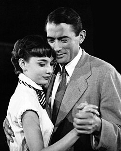 Peck and Audrey Hepburn in a promotional still for Roman Holiday (1953)