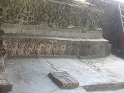 Close up of bas reliefs of eagle warriors in the Eagle building of the Templo Mayor complex. Some of the original paint can still be seen.