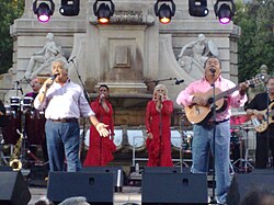 Los del Río (pictured) earned their first Hot 100 number-one single with "Macarena", which stayed at the top position for fourteen straight weeks.