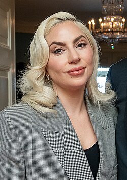 Lady Gaga's (pictured) sixth studio album, Mayhem, spawned two singles that appear on the list, with "Die with a Smile" ranking at number one and "Abracadabra" coming in at number 56.