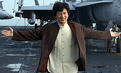 Chan on the USS Kitty Hawk in 2002 during the carrier's visit to Hong Kong[62]